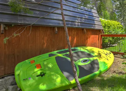 Paddleboards by the shed